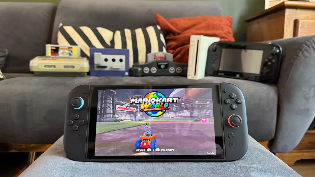 The Nintendo Switch 2 with other nintendo consoles in the background